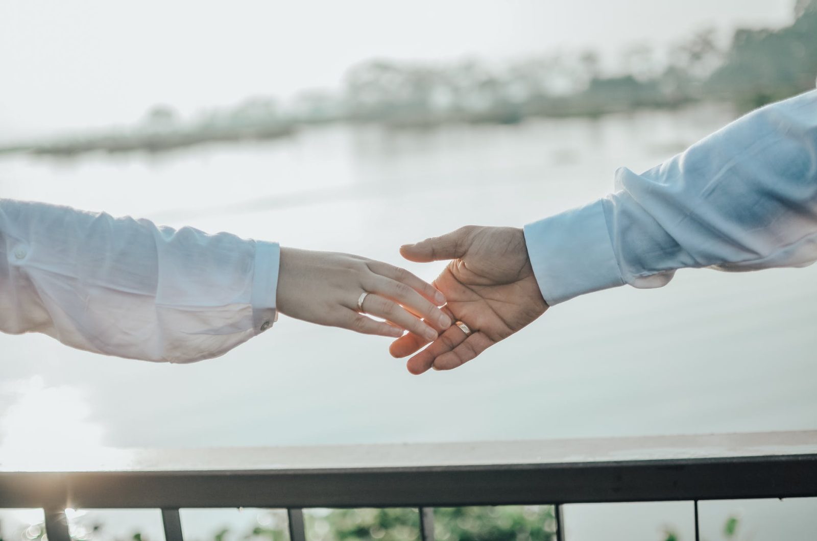 man and woman holding hands