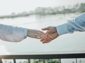 man and woman holding hands