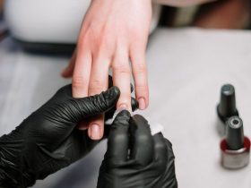 person holding black hand spinner