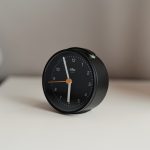 black and white analog desk clock