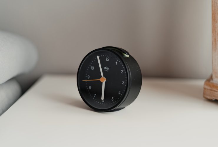 black and white analog desk clock