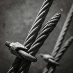 a black and white photo of a rope