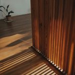 brown wooden staircase with brown wooden railings