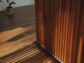 brown wooden staircase with brown wooden railings