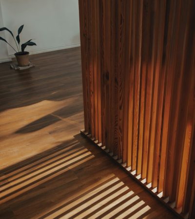 brown wooden staircase with brown wooden railings